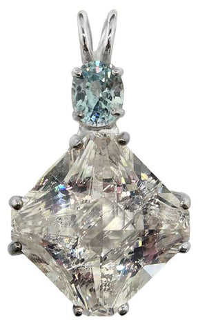 Danburite Small Magician Stone™ with Oval Cut Blue Zircon