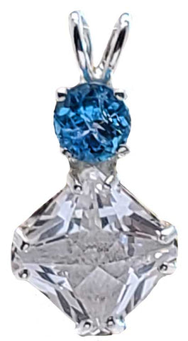 Clear Quartz Mini Magician Stone™ with Round  Cut Blue Topaz